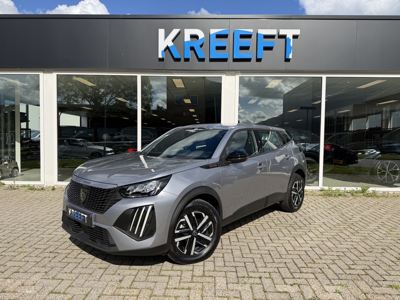 Peugeot 2008 - 1.2 Hybrid 145 Style Apple Carplay | Climate - AutoWereld.nl