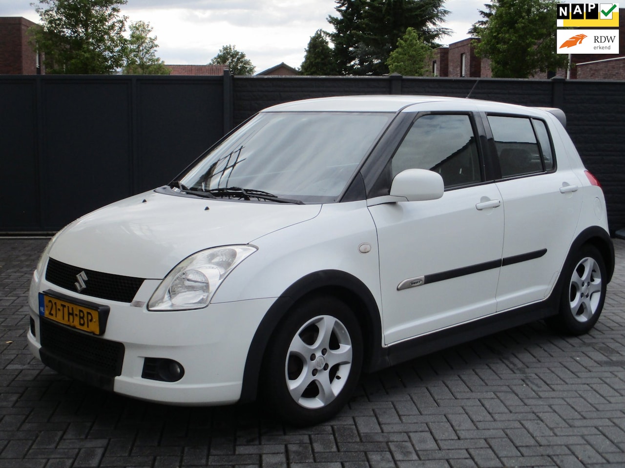 Suzuki Swift - 1.3 Shogun Sport Airco 5 deurs Parelmoer ! - AutoWereld.nl
