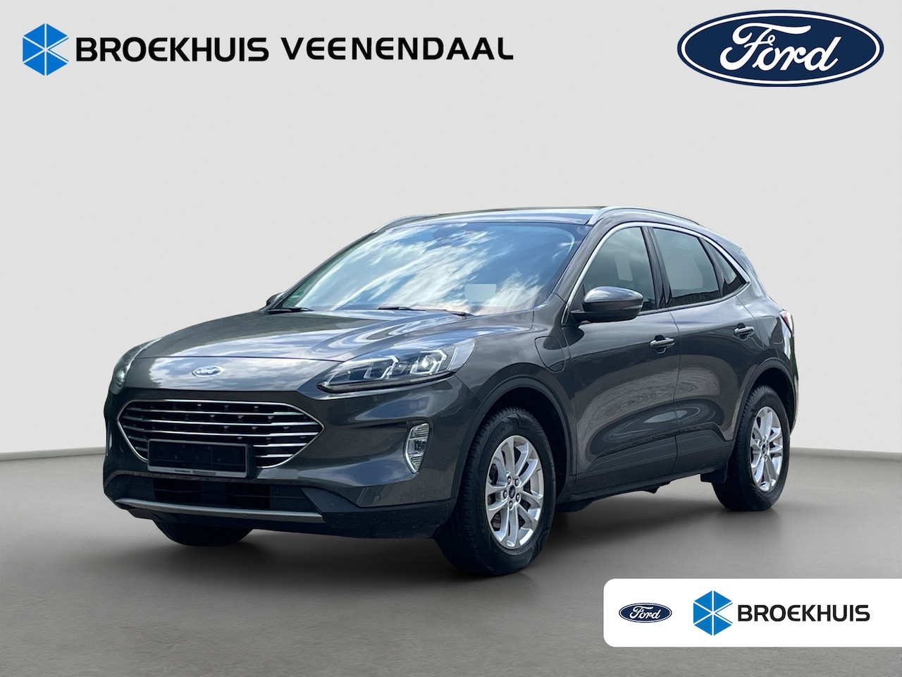 Ford Kuga - 2.5 PHEV Titanium | Trekhaak | Winter Pack | Cruise Control | Apple Carplay | Navigatie - AutoWereld.nl