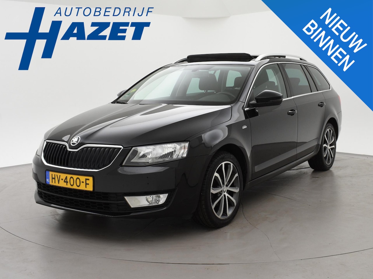 Skoda Octavia Combi - 1.6 TDI EDITION BUSINESSLINE + PANO | TREKHAAK | CAMERA | STOELVERW. | NAVIGATIE | DAB - AutoWereld.nl