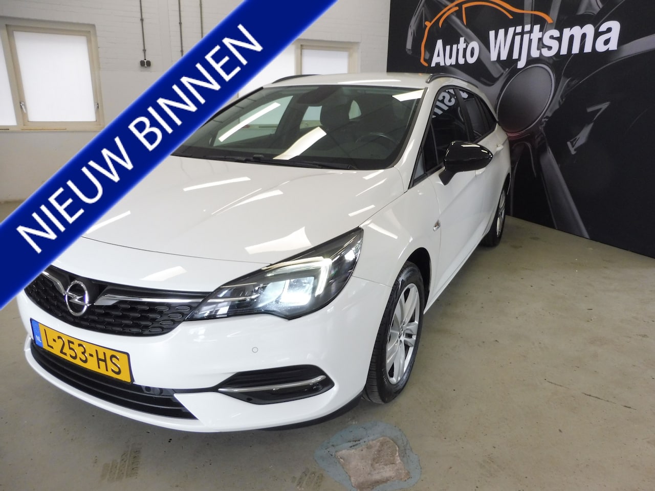 Opel Astra Sports Tourer - 1.2 Edition Trekhaak | Cruise | Camera | Navi | LED | LMV | 1e eig | NL auto - AutoWereld.nl