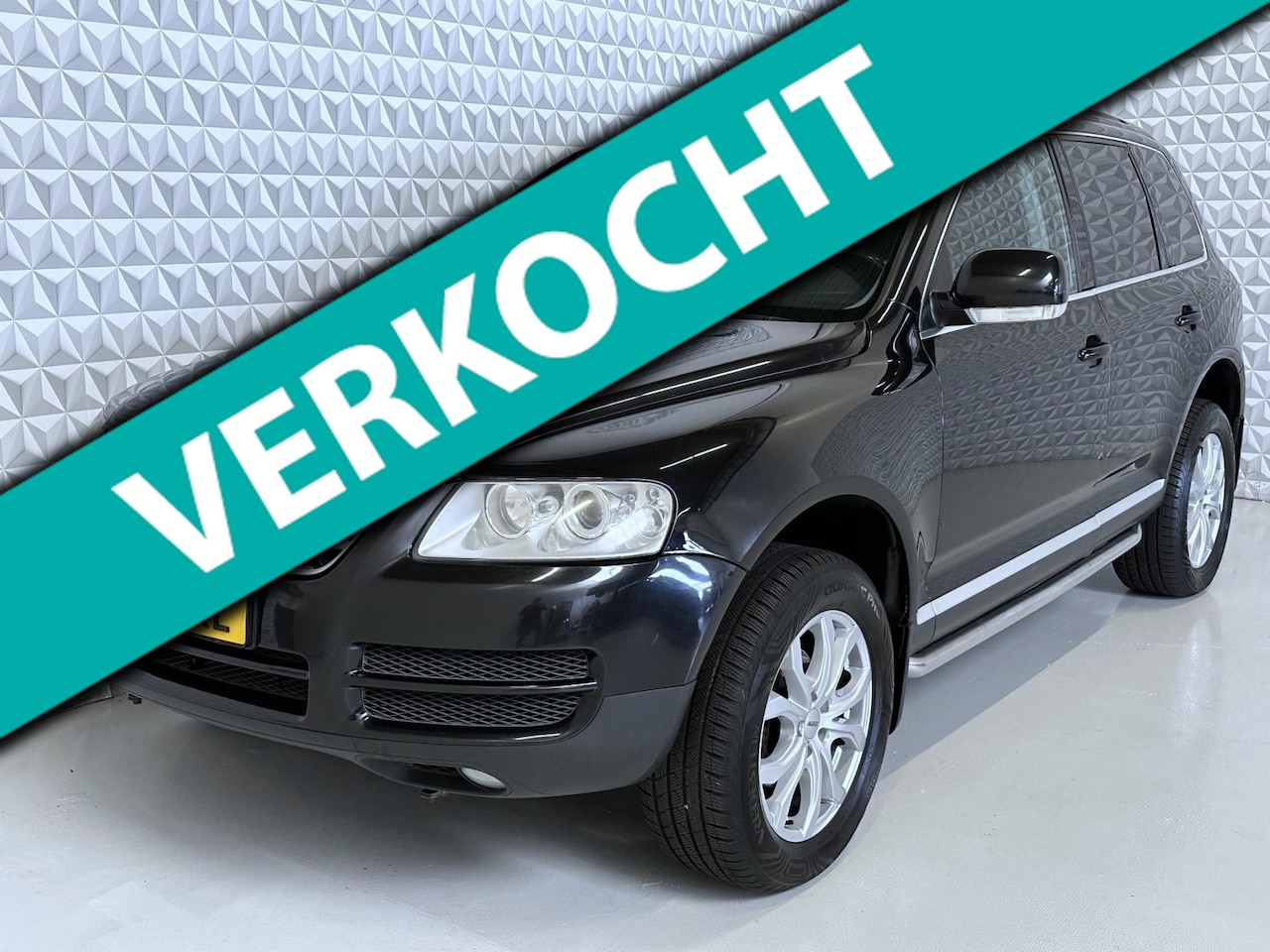 Volkswagen Touareg - 2.5 TDI Grijs kenteken + Navigatie + Leder + Stoelverwarming - AutoWereld.nl