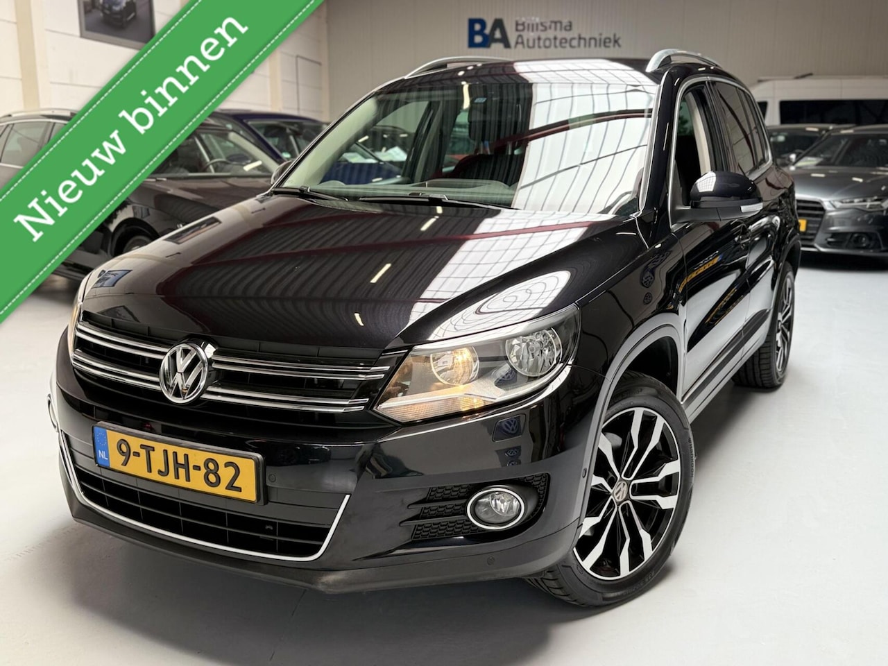 Volkswagen Tiguan - 1.4 TSI Sport&Style | 18'' | Trekhaak - AutoWereld.nl