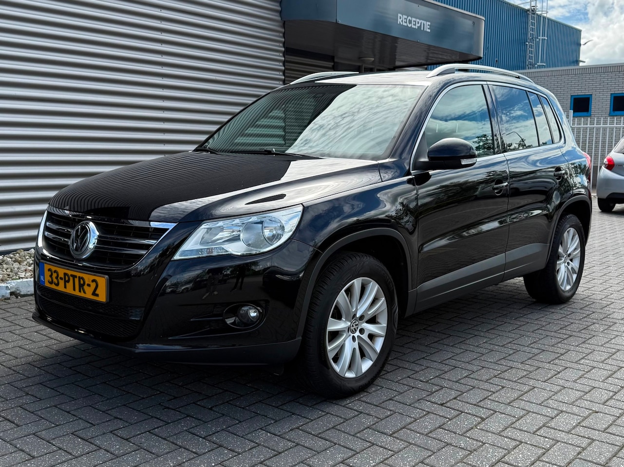 Volkswagen Tiguan - 1.4 TSI Sport&Style - AutoWereld.nl