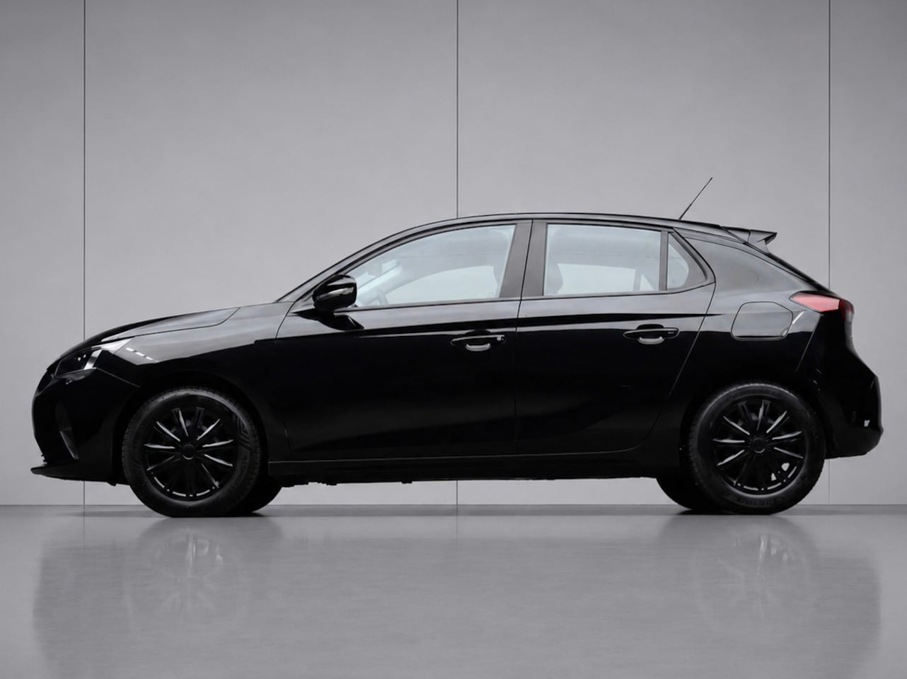 Opel Corsa - 1.2 Edition Sport (APPLE CARPLAY,NAVI,CRUISE,LANE ASSIST,BLACK EDITION,SPORTSTOELEN,LM VEL - AutoWereld.nl