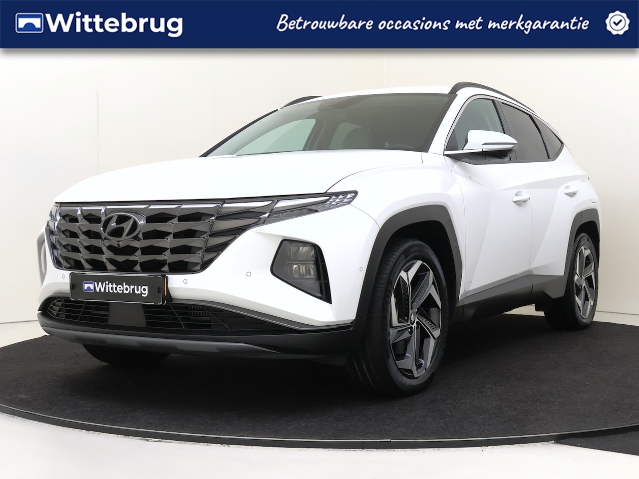 Hyundai Tucson - 1.6 T-GDI PHEV Premium 4WD TREKHAAK | LICHT LEDEREN INTERIEUR | FULL LED | KEYLESS | ZEER - AutoWereld.nl