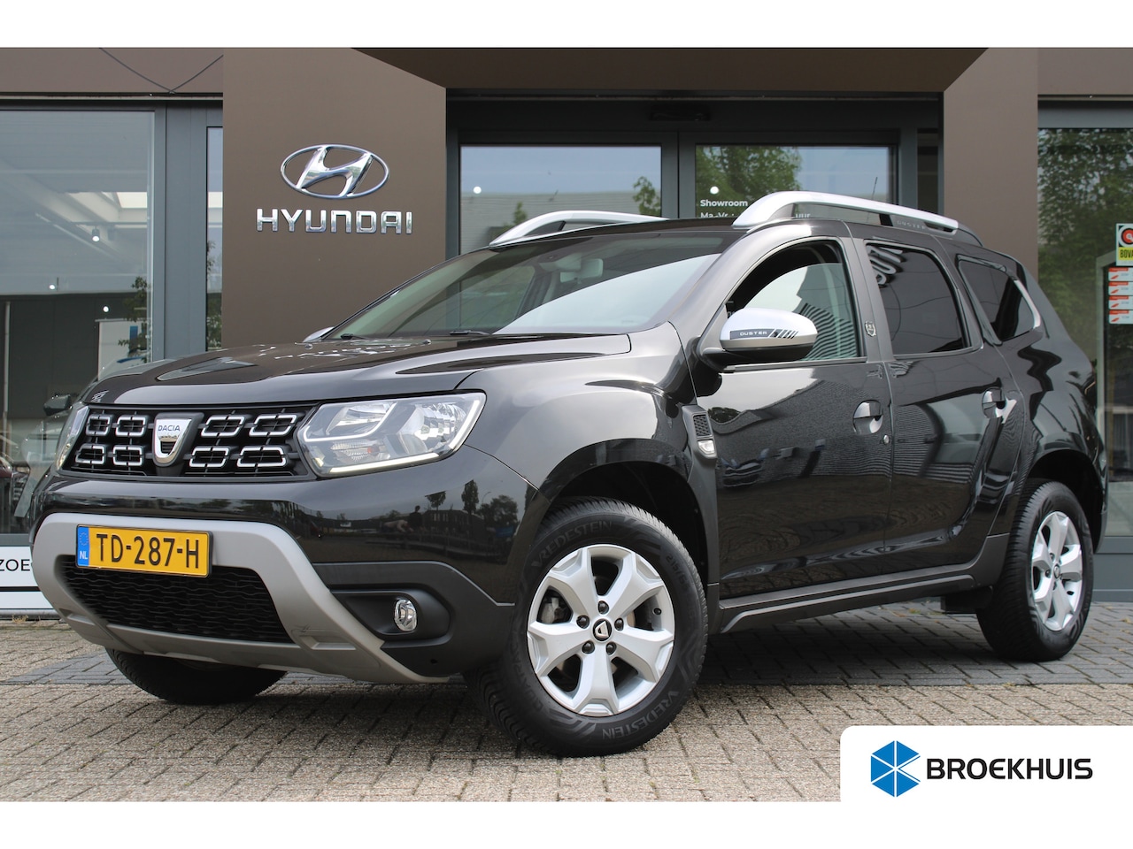 Dacia Duster - 1.2 TCe Comfort 125pk | Airco (handmatig) | All-seasonbanden | Trekhaak (vast) - AutoWereld.nl