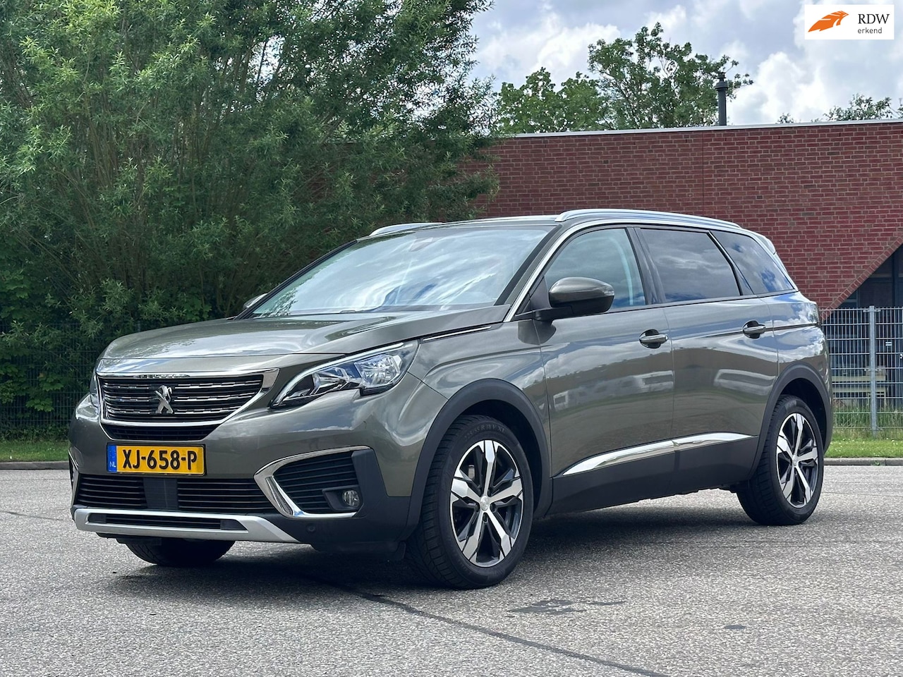Peugeot 5008 - 1.2 PureTech Advanced Grip Control Allure 7P*Navigatie*Dealer onderhouden*Cruise*Clima*LM - AutoWereld.nl