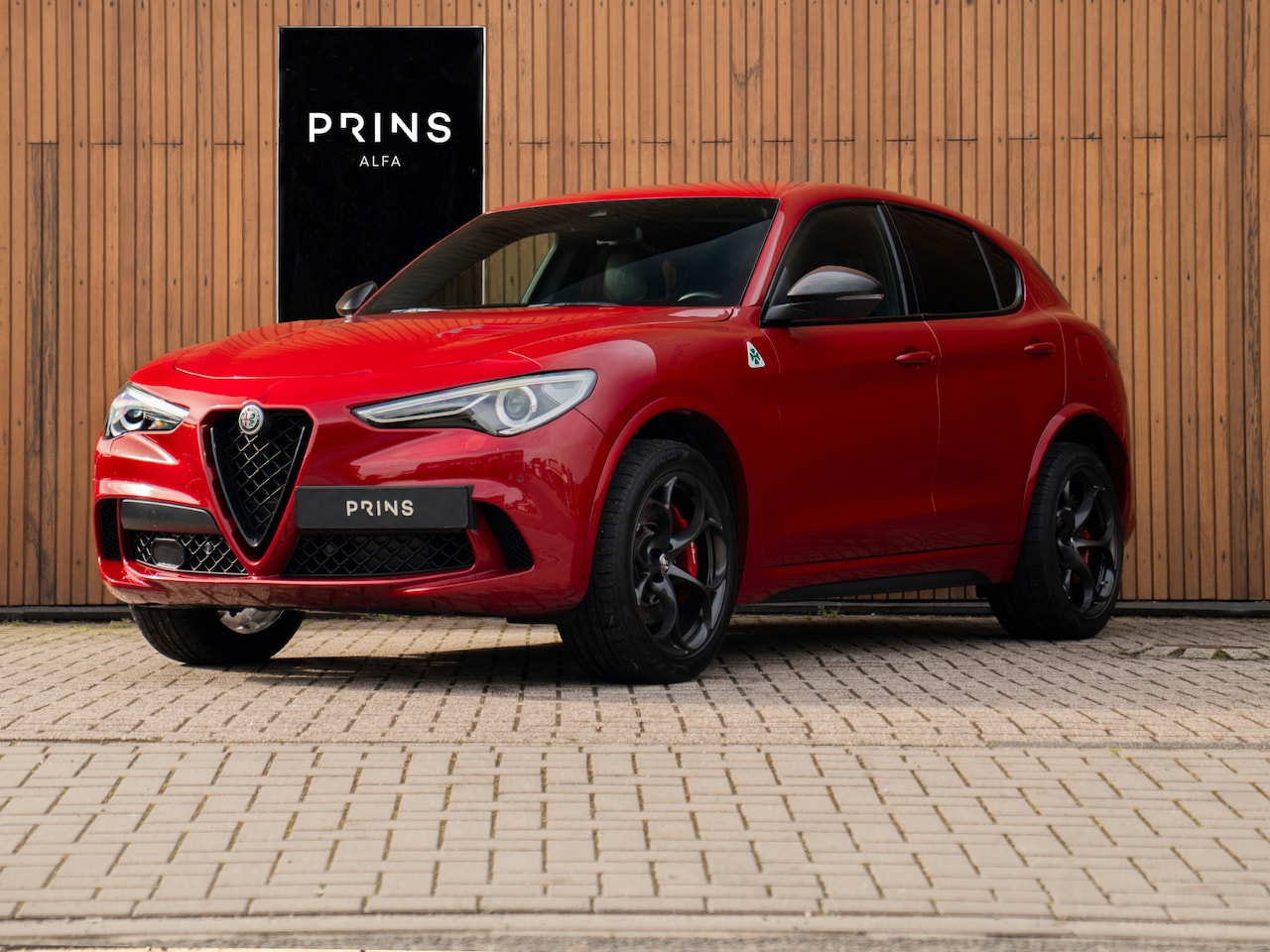 Alfa Romeo Stelvio - 2.9 V6 AWD Quadrifoglio | Harman/Kardon | Rosso Competizione | Adapt. cruise | CarPlay | C - AutoWereld.nl