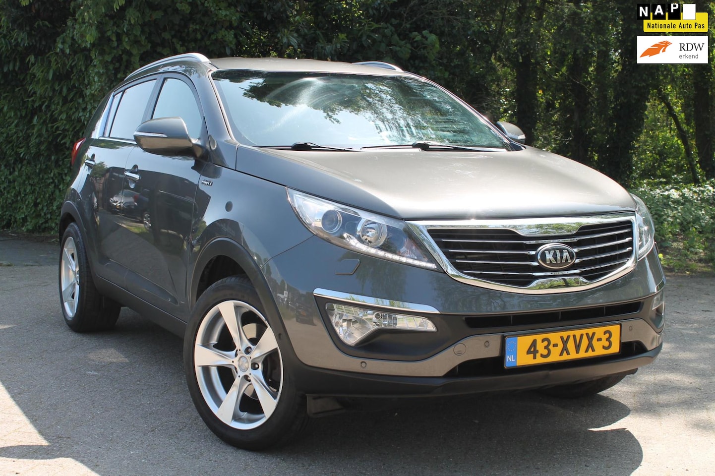 Kia Sportage - 2.0 Super Pack AWD 2.0 Super Pack AWD, 4x4, Navi, Cruise, Leder, Trekhaak, Nap - AutoWereld.nl