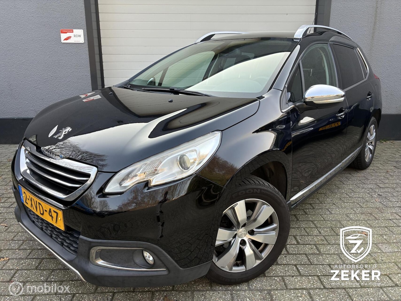 Peugeot 2008 - 1.2 PureTech Allure / airco / cruise / pano / - AutoWereld.nl
