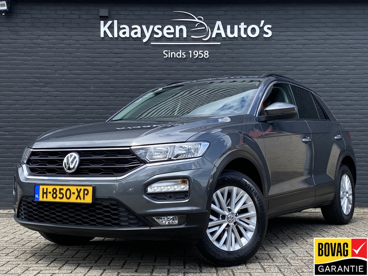 Volkswagen T-Roc - 1.0 TSI Style Business | adaptieve cruise control | navigatie | parkeersensoren | all seas - AutoWereld.nl