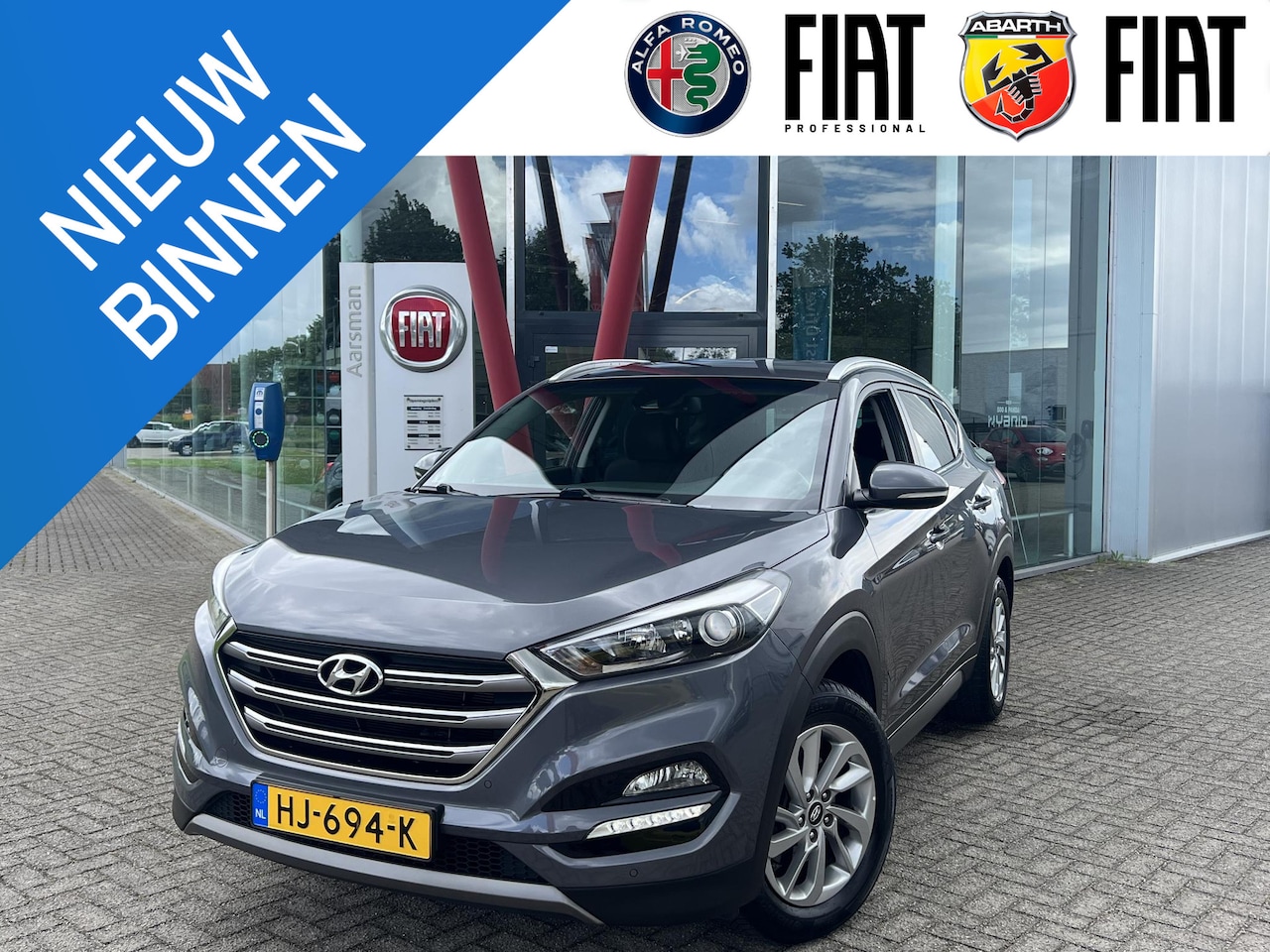Hyundai Tucson - 1.6 GDi Comfort | Camera | Stoelverwarming | Trekhaak | Navi | Climate control - AutoWereld.nl