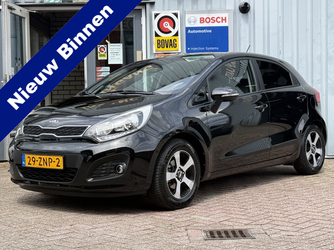 Kia Rio - 1.2 CVVT Design Edition | AIRCO | CRUISE | PDC | LICHTMETAAL VELG | NW APK | - AutoWereld.nl