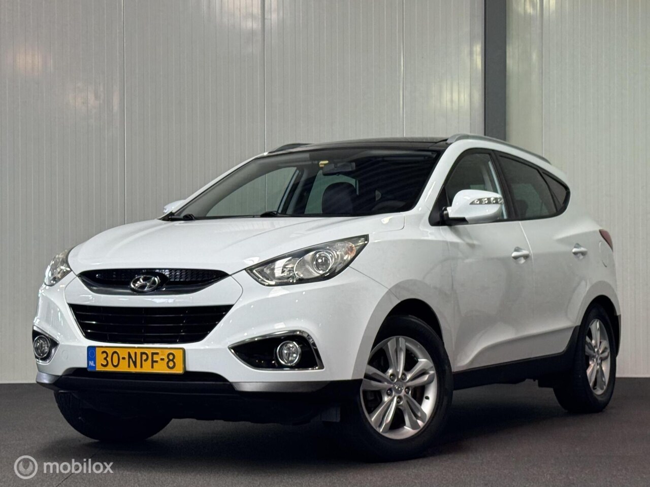 Hyundai ix35 - 2.0i Business Ed. AUTOMAAT [ NAP trekhaak pano ] - AutoWereld.nl