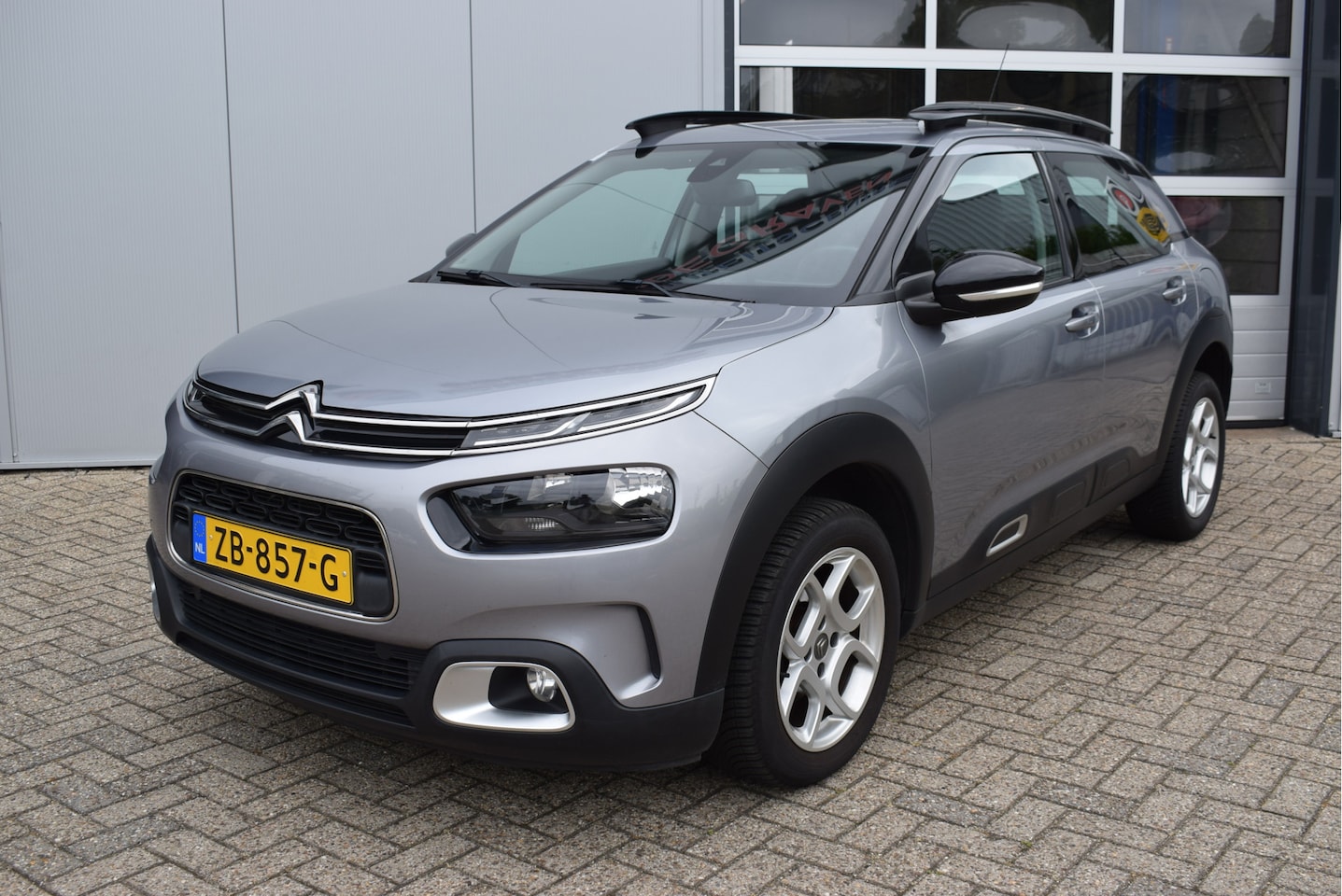 Citroën C4 Cactus - 1.2 Business 110PK | NL-Auto | Distributie vv | Navi - AutoWereld.nl