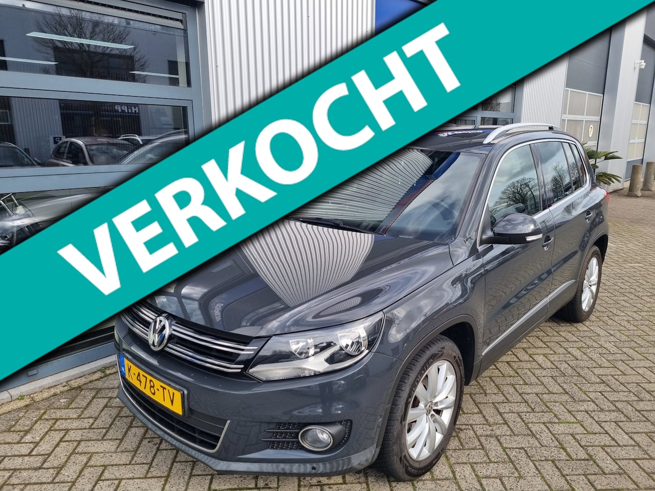 Volkswagen Tiguan - 1.4 TSI Sport&Style | leer | pano dak | trekhaak | navi - AutoWereld.nl