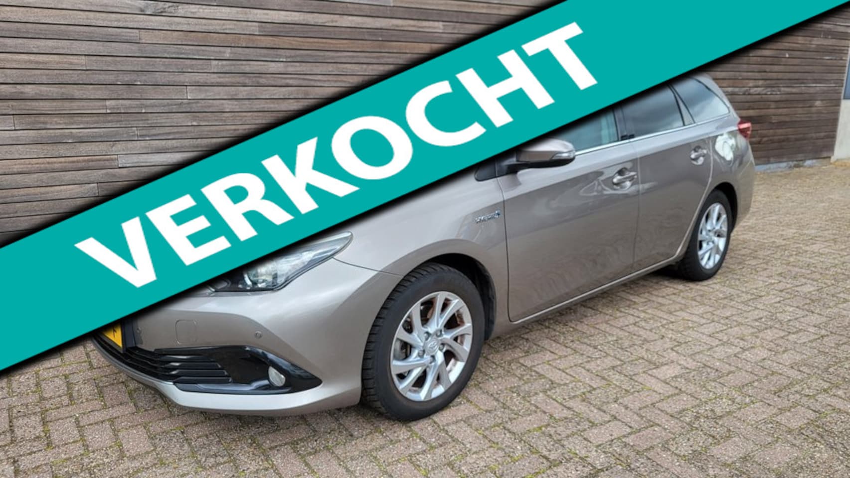 Toyota Auris Touring Sports - 1.8 Hybrid Lease panorama dak - AutoWereld.nl