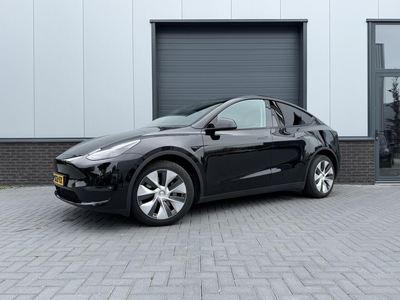 Tesla Model Y - Long Range AWD 75 kWh Long Range AWD 75 kWh - AutoWereld.nl