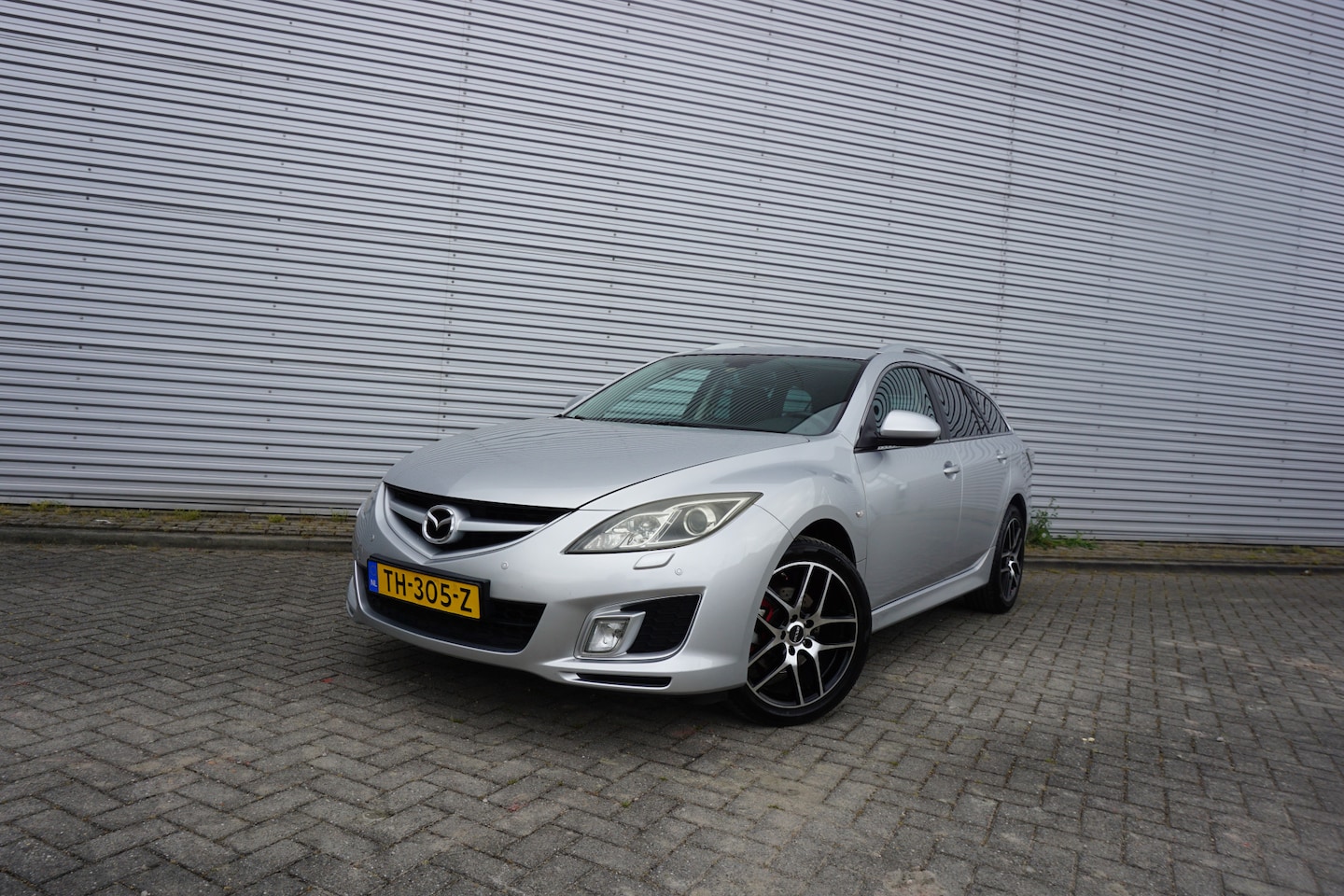 Mazda 6 Sportbreak - 2.5 S-VT GT-L Climate / Navi / Cruise / Stoelverw. / Parkeers. / Lm velgen / Trekhaak - AutoWereld.nl