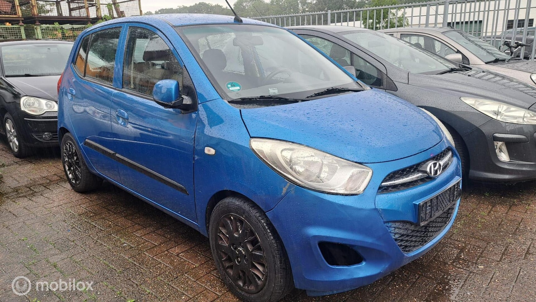 Hyundai i10 - 1.1 i-Motion Cool Barst in voorruit Export - AutoWereld.nl