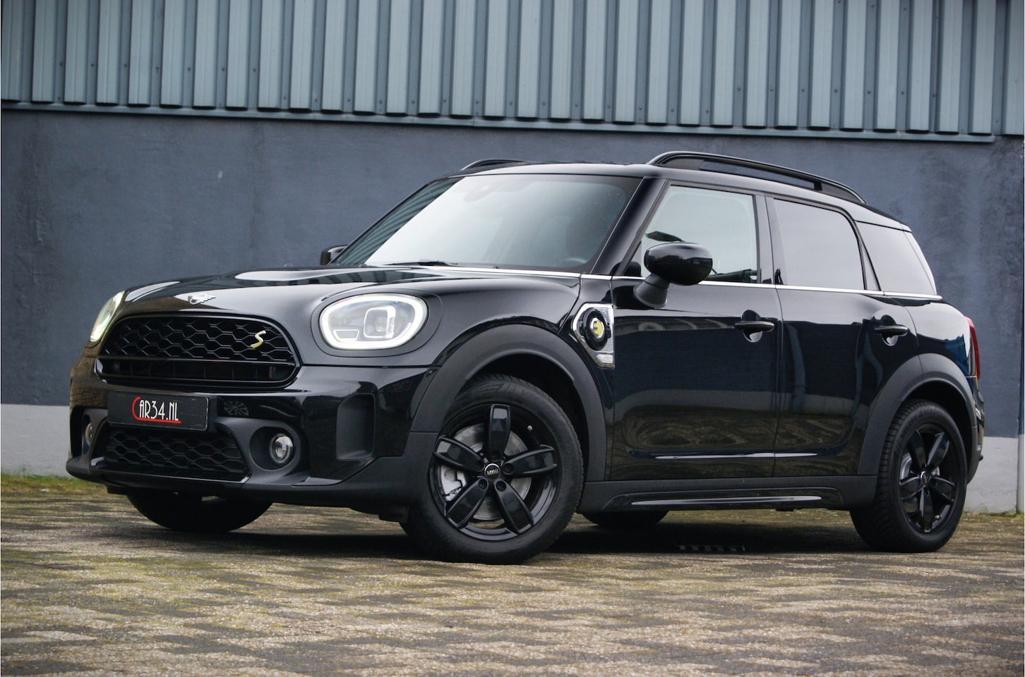 MINI Countryman - Mini 2.0 Cooper SE 220PK ALL4 Facelift/Blackpack/LED/Leer/Carplay - AutoWereld.nl