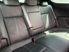 Opel Astra GTC - 1.6 Turbo Sport met leer en parkeersensoren en navigatie en bluetooth en cruise controle e