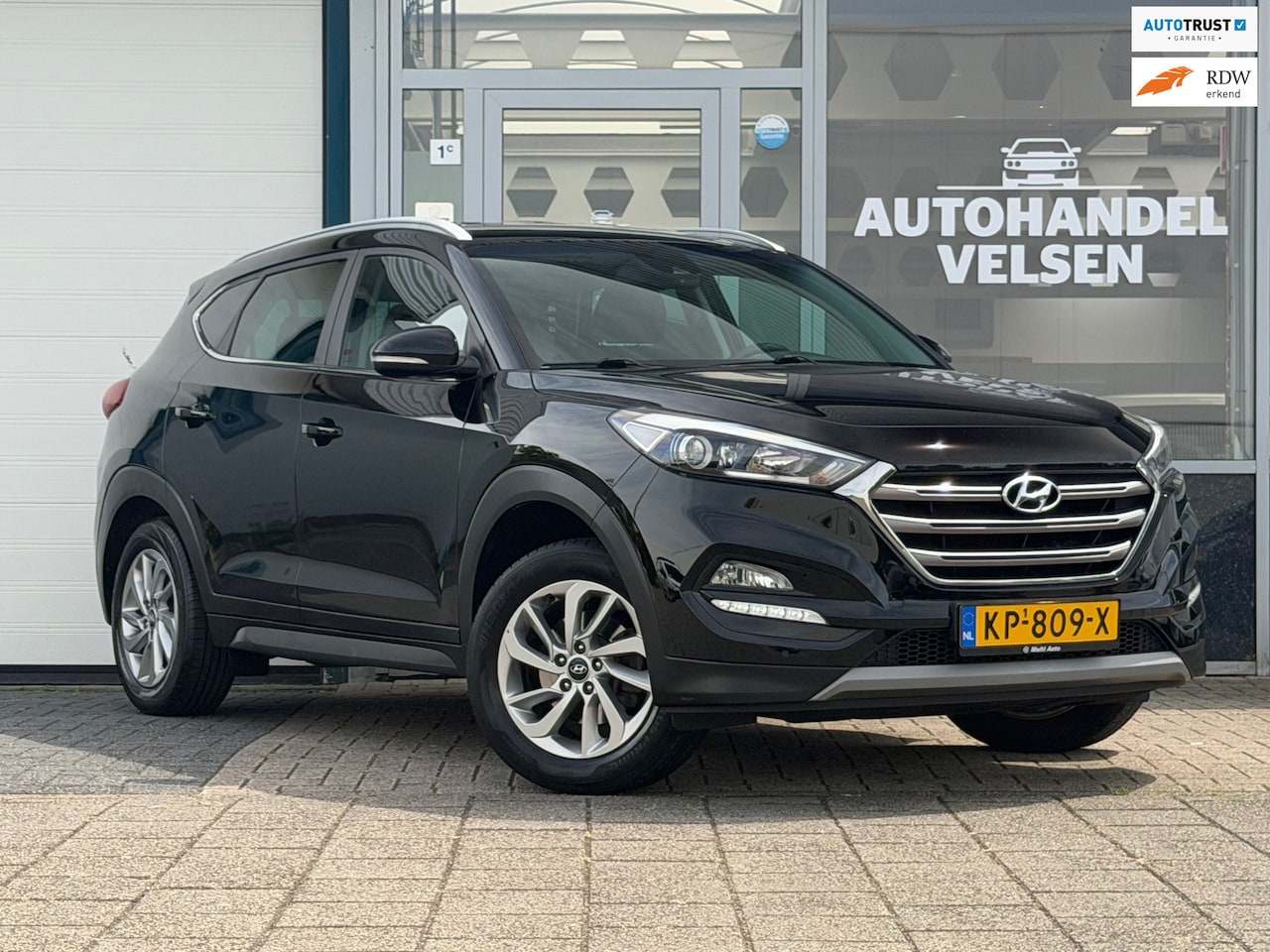Hyundai Tucson - 1.6 GDi Comfort Navi Bluetooth - AutoWereld.nl