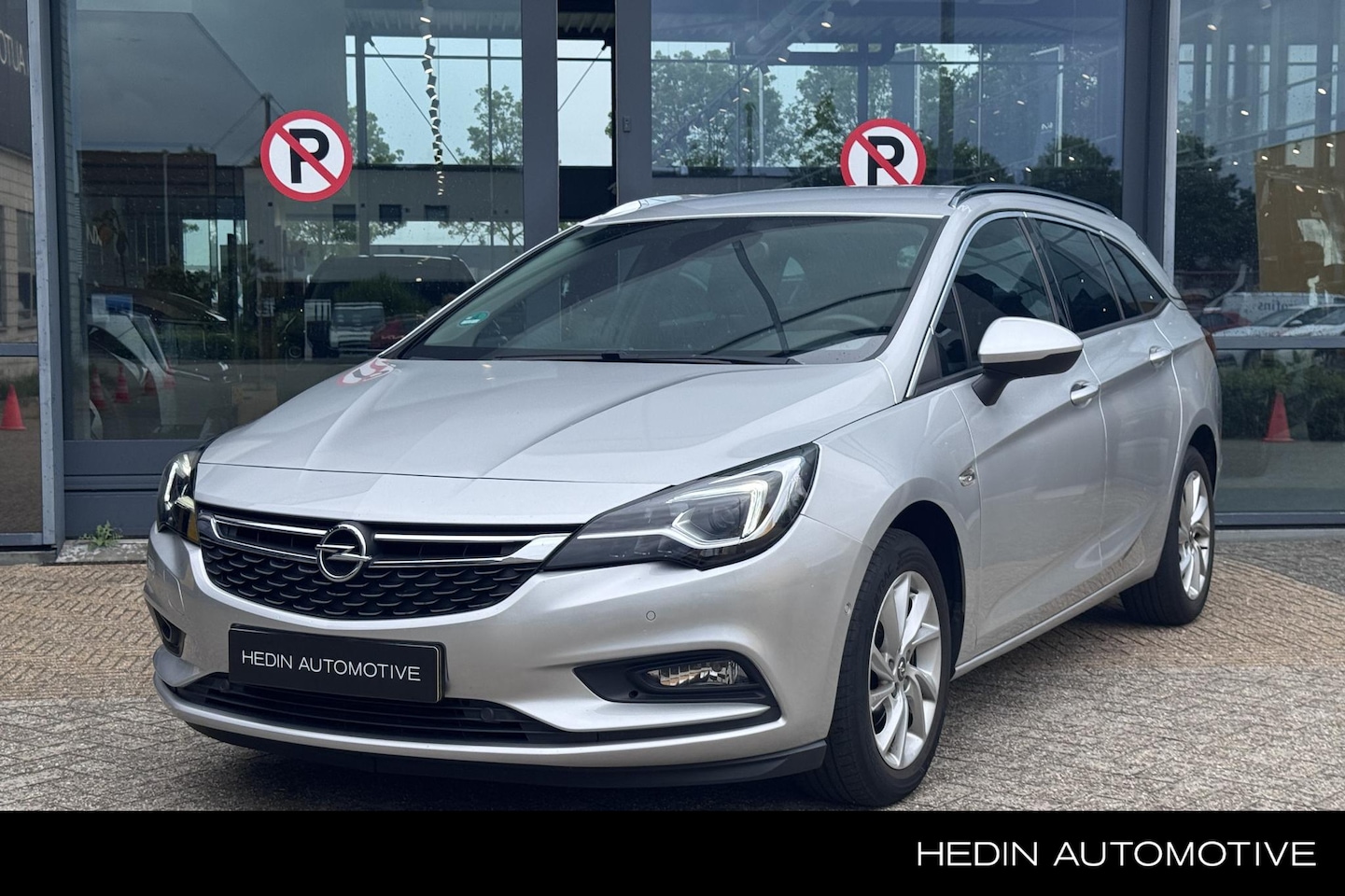 Opel Astra Sports Tourer - 1.4 150PK Innovation Airco | LM velgen | Camera en parkeersensoren | Dodehoek detectie | N - AutoWereld.nl