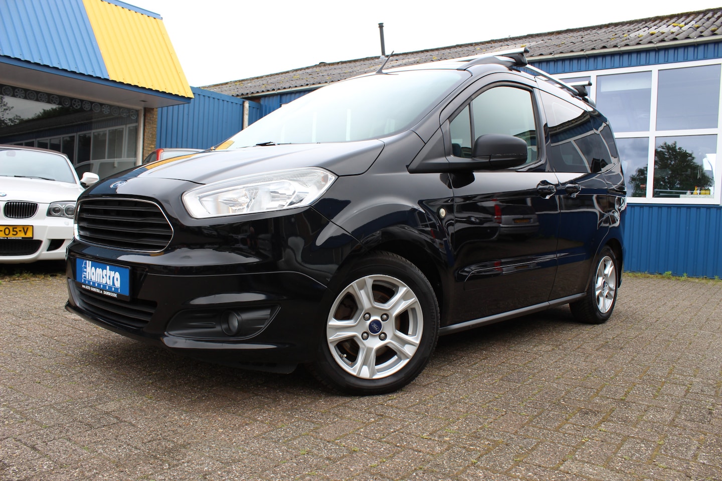 Ford Tourneo Courier - 1.0i "Titanium" Clima - Cruise !!! 100 Pk - AutoWereld.nl