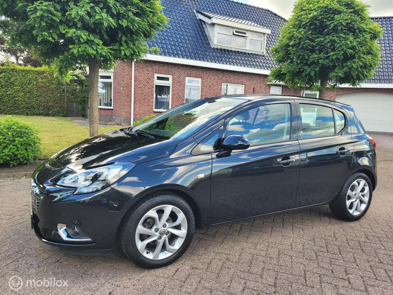 Opel Corsa - 1.4 1.4 ,5 deurs/airco/camera/cruise. - AutoWereld.nl