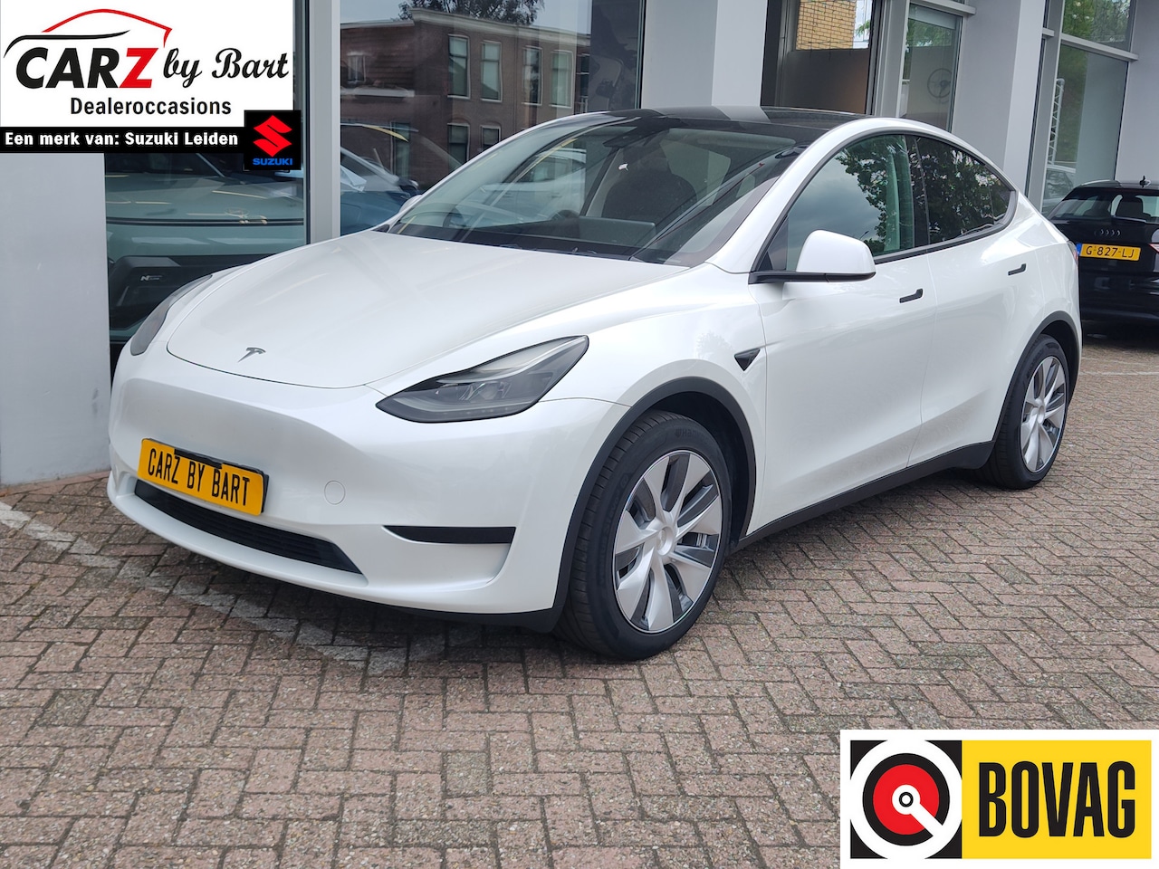 Tesla Model Y - RWD 60 kWh 300 PK FSD 3 | Panoramadak | Leder - AutoWereld.nl