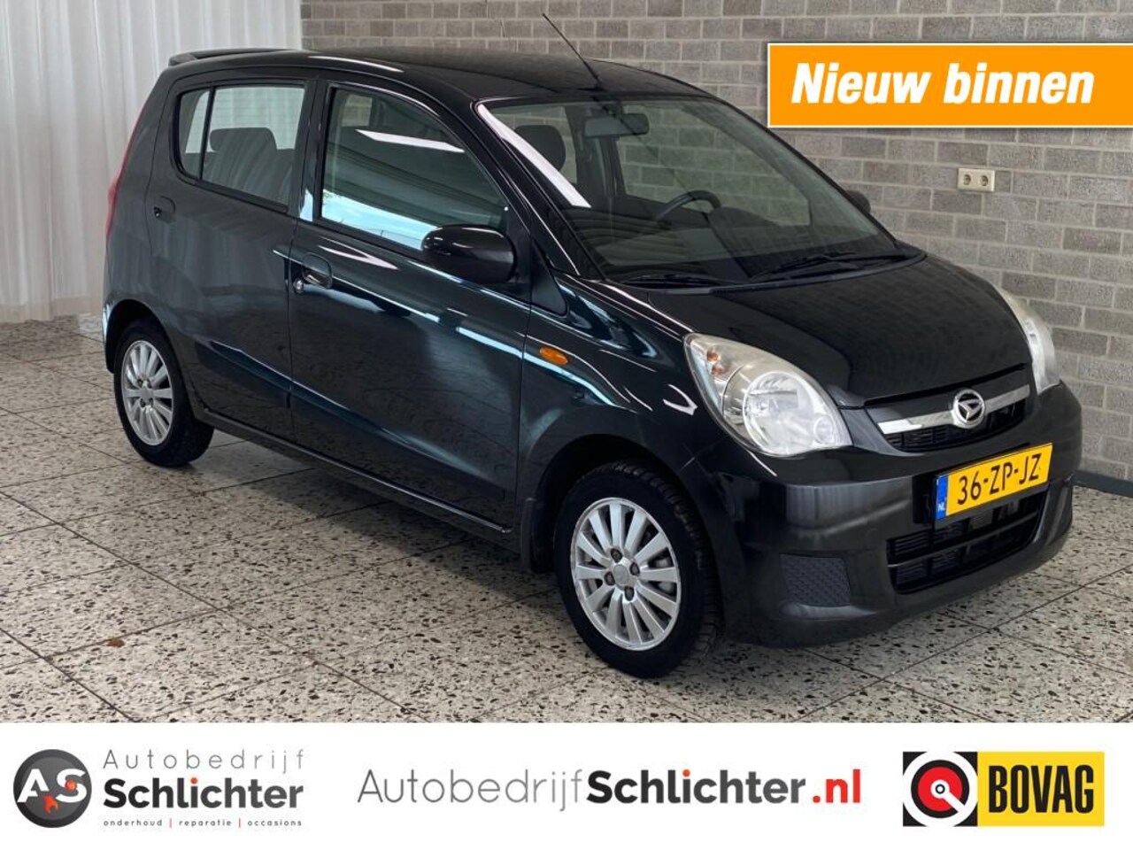 Daihatsu Cuore - 1.0 Premium Airco/Radio-CD/El-ramen/LM-Velgen/Versch. achterbank - AutoWereld.nl