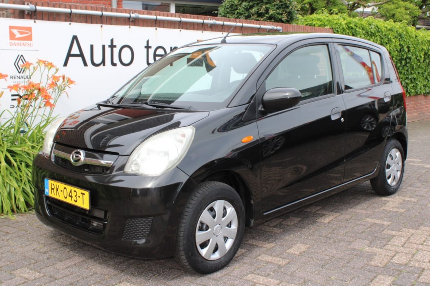 Daihatsu Cuore - 10.12V Premium airco - AutoWereld.nl