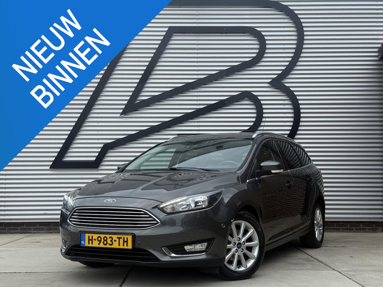 Ford Focus Wagon - 1.0 Titanium 1e Eigenaar|Navi|Clima|Cruise|Carplay|Stoel+Stuur verw|PDC V+A|APK tot 12-202 - AutoWereld.nl