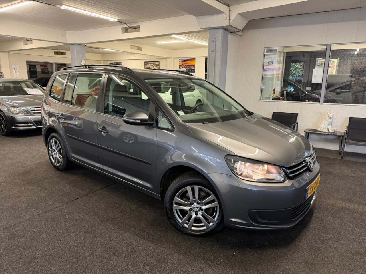 Volkswagen Touran - 1.2 TSI *NAP*NAVI*velgen*2013 - AutoWereld.nl
