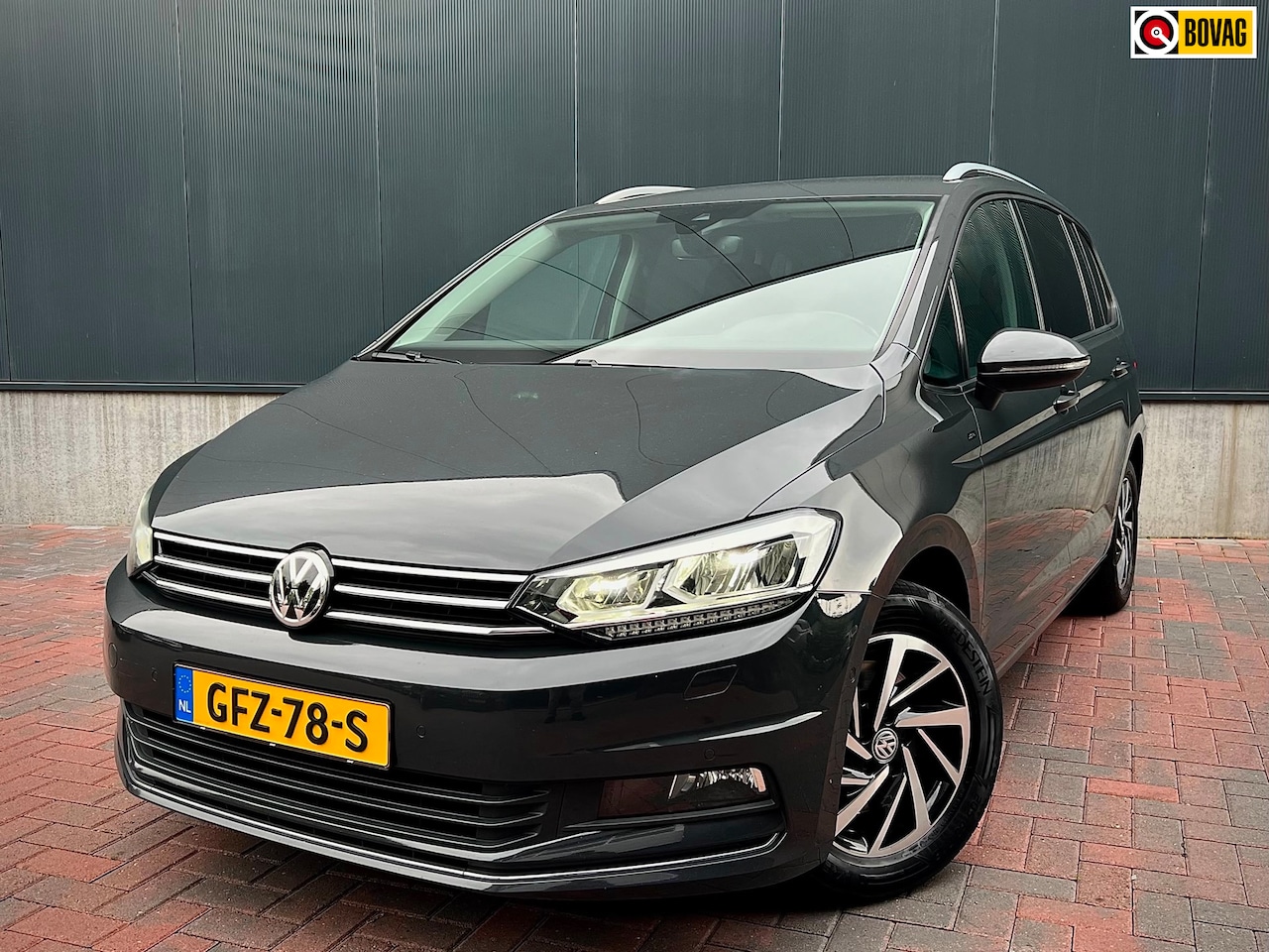 Volkswagen Touran - 1.5 TSI Comfortline 7p * Navi * Climate * Led * Dealer Onderhouden * - AutoWereld.nl