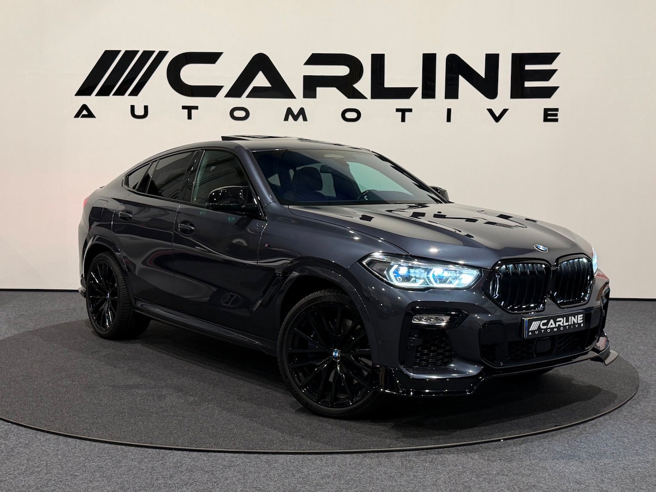 BMW X6 - M50i High Executive PANO HUD VIRTUAL ACC SKYLOUNGE SFEERVERL. 360 ASSIST H&K NAP GARANTIE - AutoWereld.nl