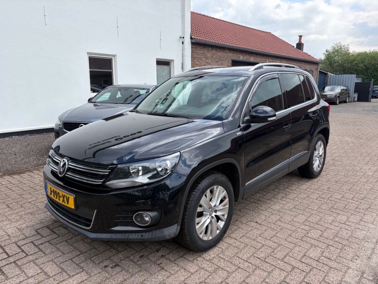 Volkswagen Tiguan - 1.4 TSI Sport&Style 1.4 TSI SportenStyle - AutoWereld.nl