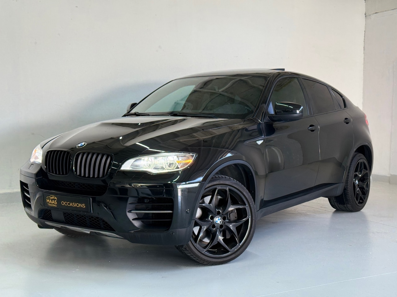 BMW X6 - M50d Automaat | M-Sport | schuifdak | Leder - AutoWereld.nl