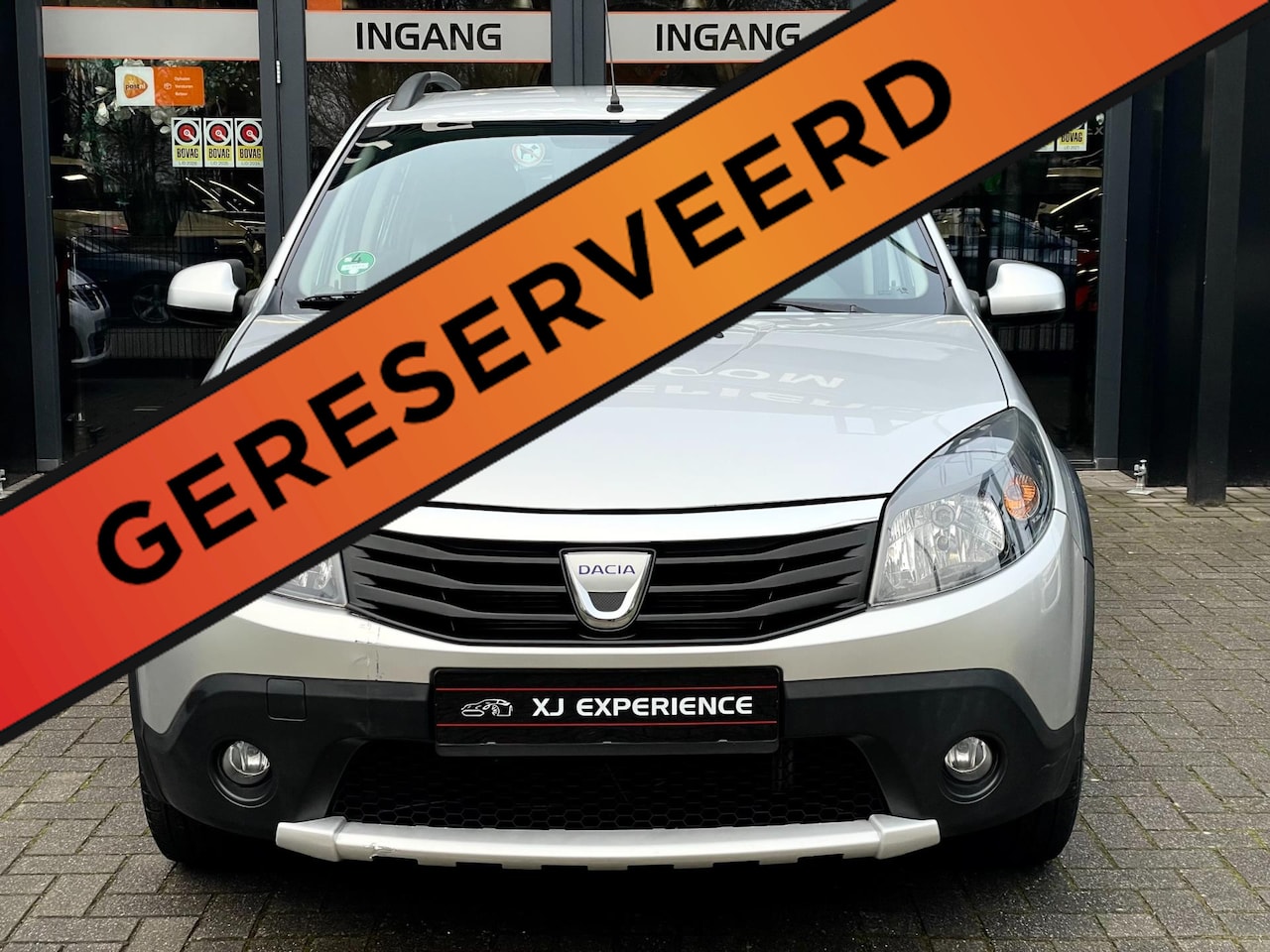 Dacia Sandero Stepway - 1.6 AIRCO CARPLAY NAVI ELECT RAMEN AFNEEMBAAR TREKHAAK 16'VELGEN DISTRIBUTIE VERVANGEN - AutoWereld.nl