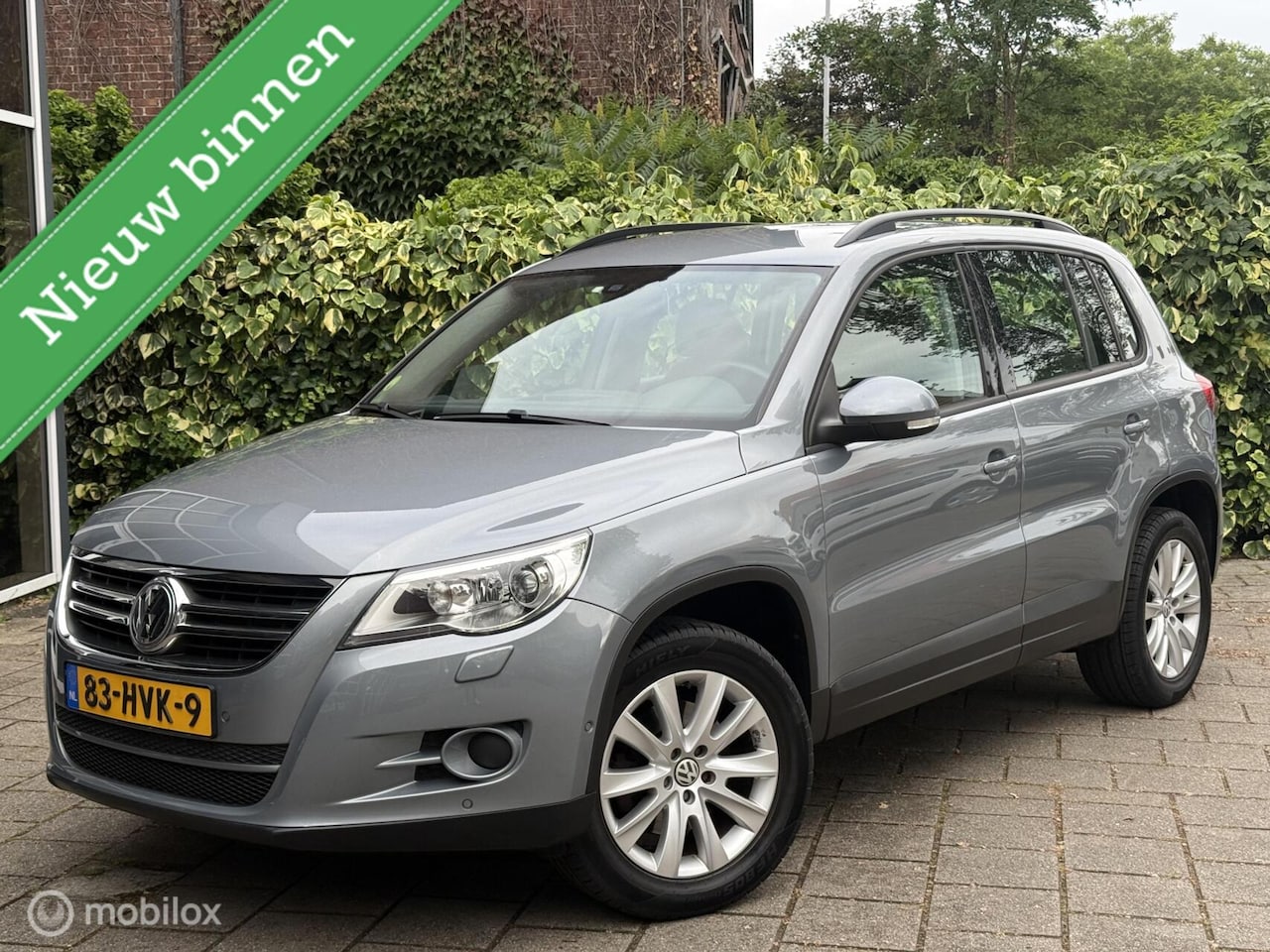 Volkswagen Tiguan - 2.0 TSI Sport&Style 4Motion - AutoWereld.nl