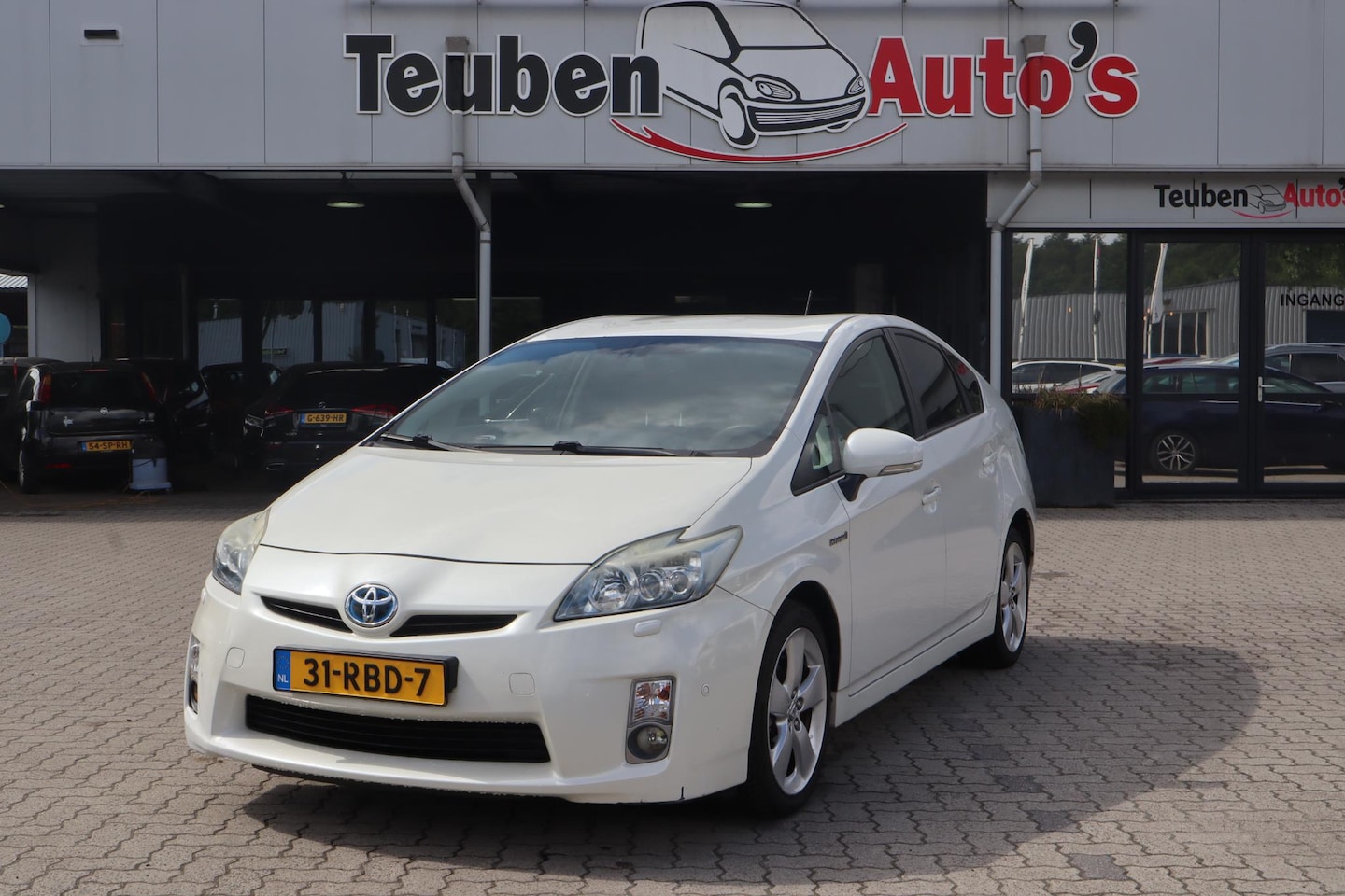 Toyota Prius - 1.8 Dynamic | Climate Control | Navigatie | Cruise Control | Lichtmetaal | - AutoWereld.nl