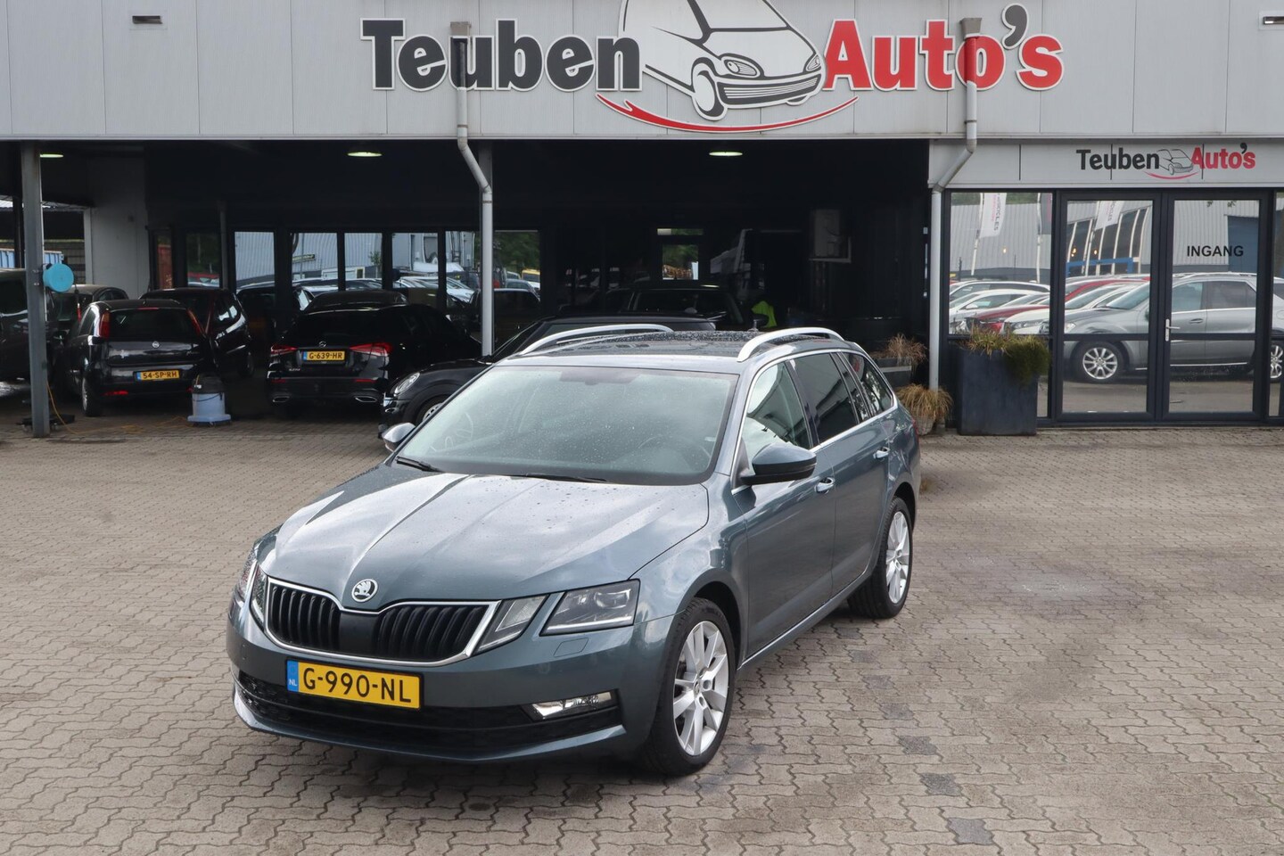 Skoda Octavia Combi - 1.6 TDI Greentech Ambition Business | BTW Auto | Trekhaak | Navigatie | Cruise control | C - AutoWereld.nl