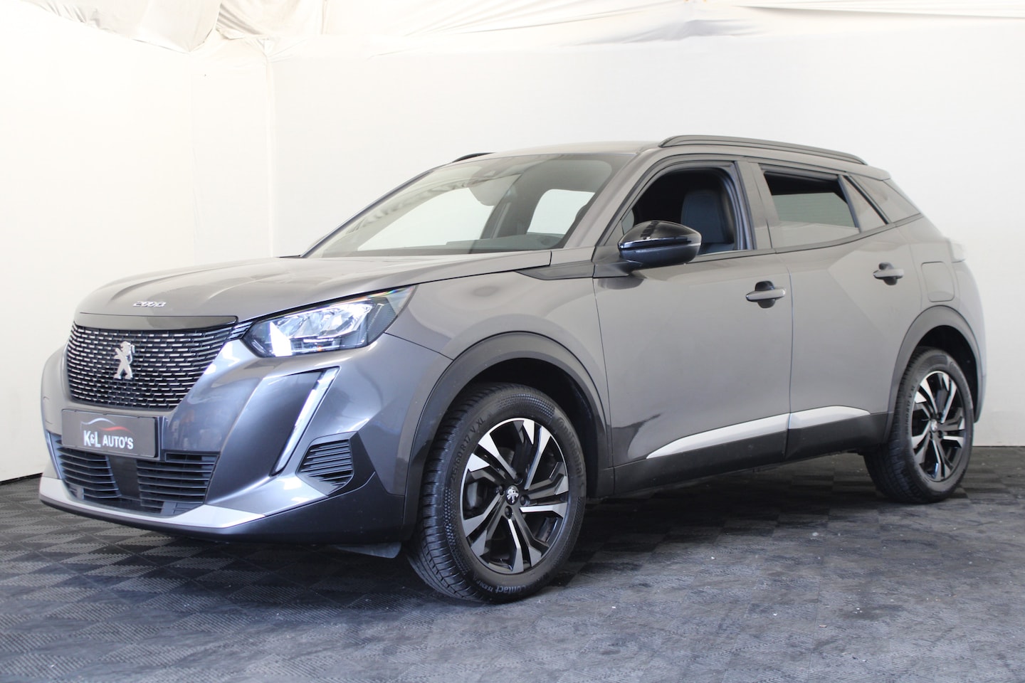 Peugeot 2008 - 1.2 PureTech Allure Pack |Navi|Camera| - AutoWereld.nl