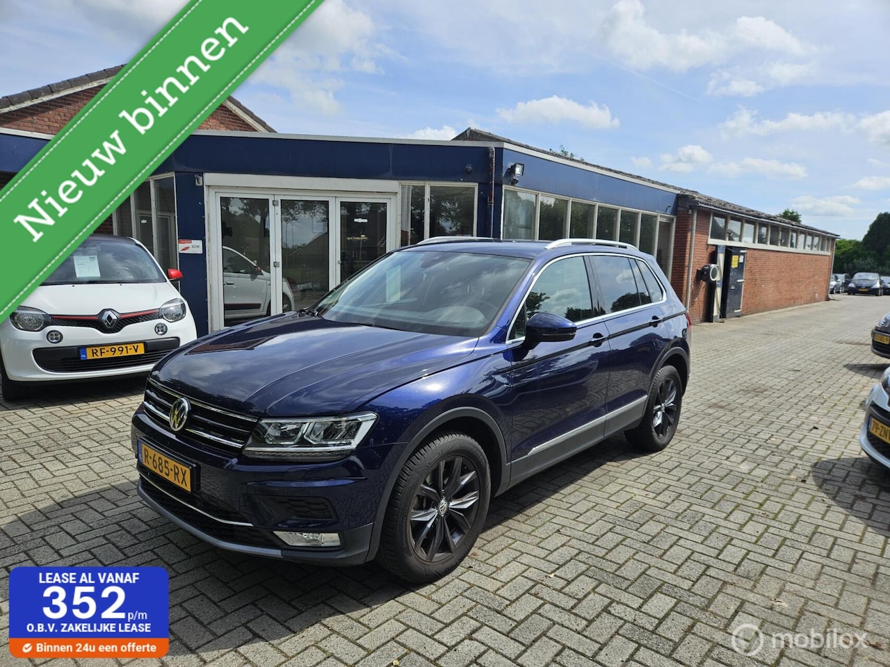 Volkswagen Tiguan - 2.0 TSI 4Motion Highline 2.0 TSI 4Motion Highline - AutoWereld.nl