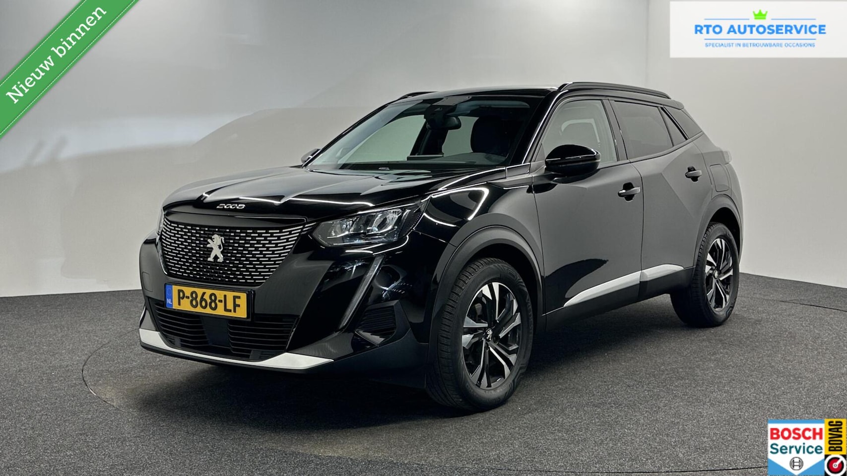 Peugeot 2008 - 1.2 PureTech Allure Pack CAMERA ECC CRUISE LM NAVI CARPLAY. - AutoWereld.nl