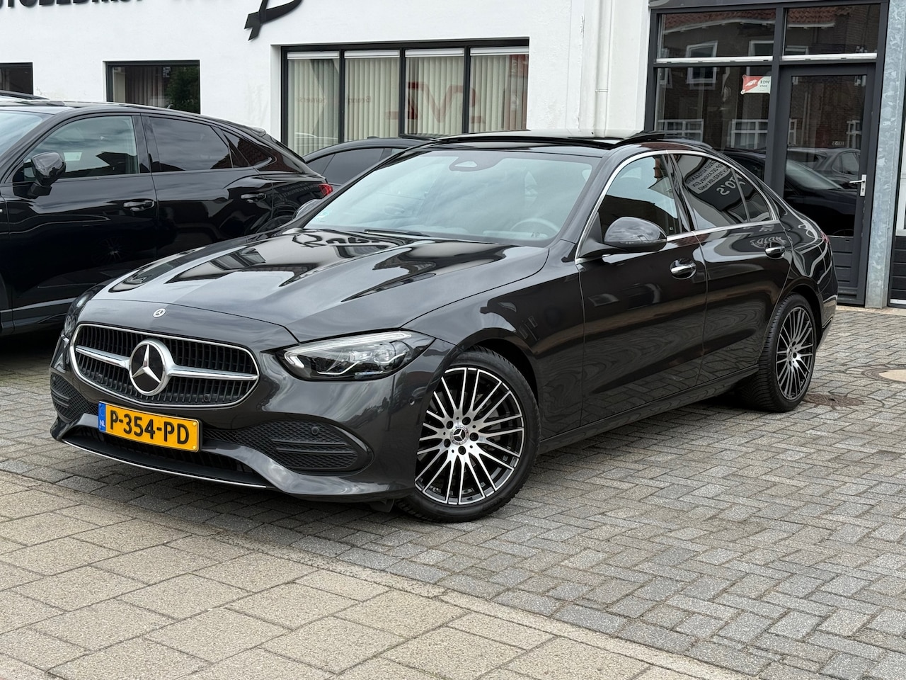 Mercedes-Benz C-klasse - 200 Luxury Line 200 Luxury Line, Panoramadak,Apple Carplay/Android,Stoelverwarming - AutoWereld.nl
