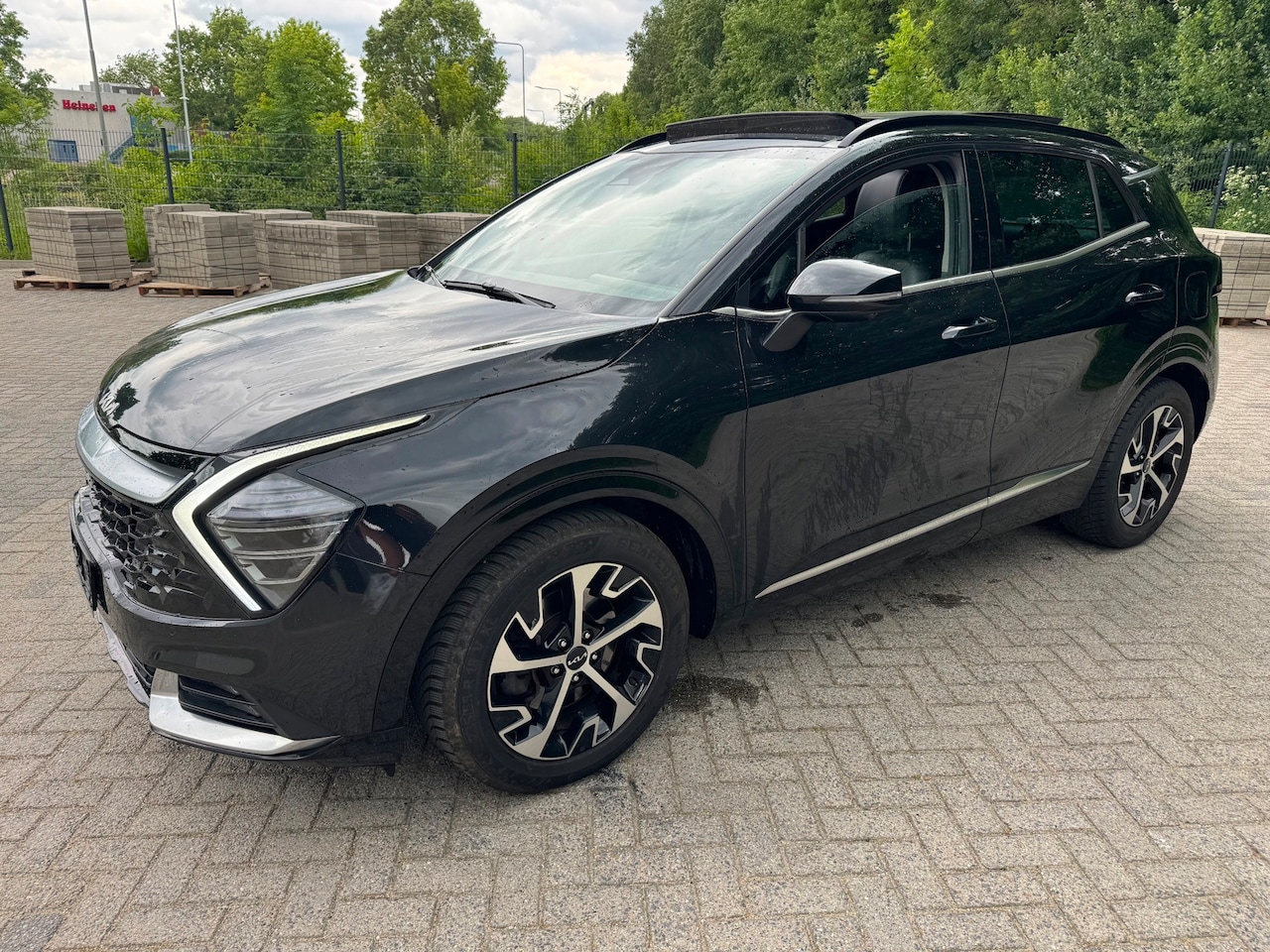 Kia Sportage - 1.6 CRDI Black Edition MHEV Pace trekhaak DCT Pano 360 full - AutoWereld.nl