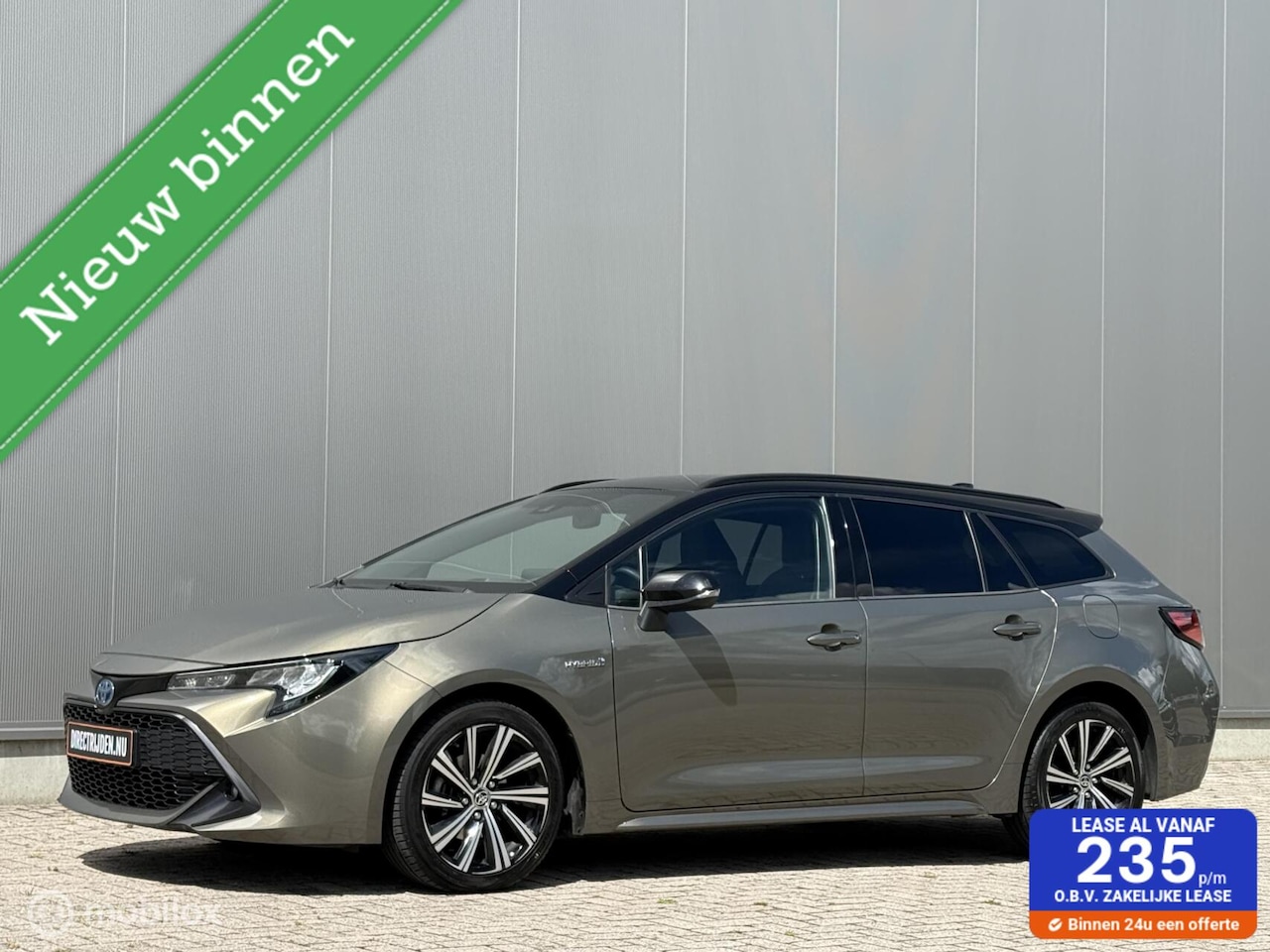 Toyota Corolla Touring Sports - 1.8 Hybrid Bi Tone | Luxe uitv - AutoWereld.nl
